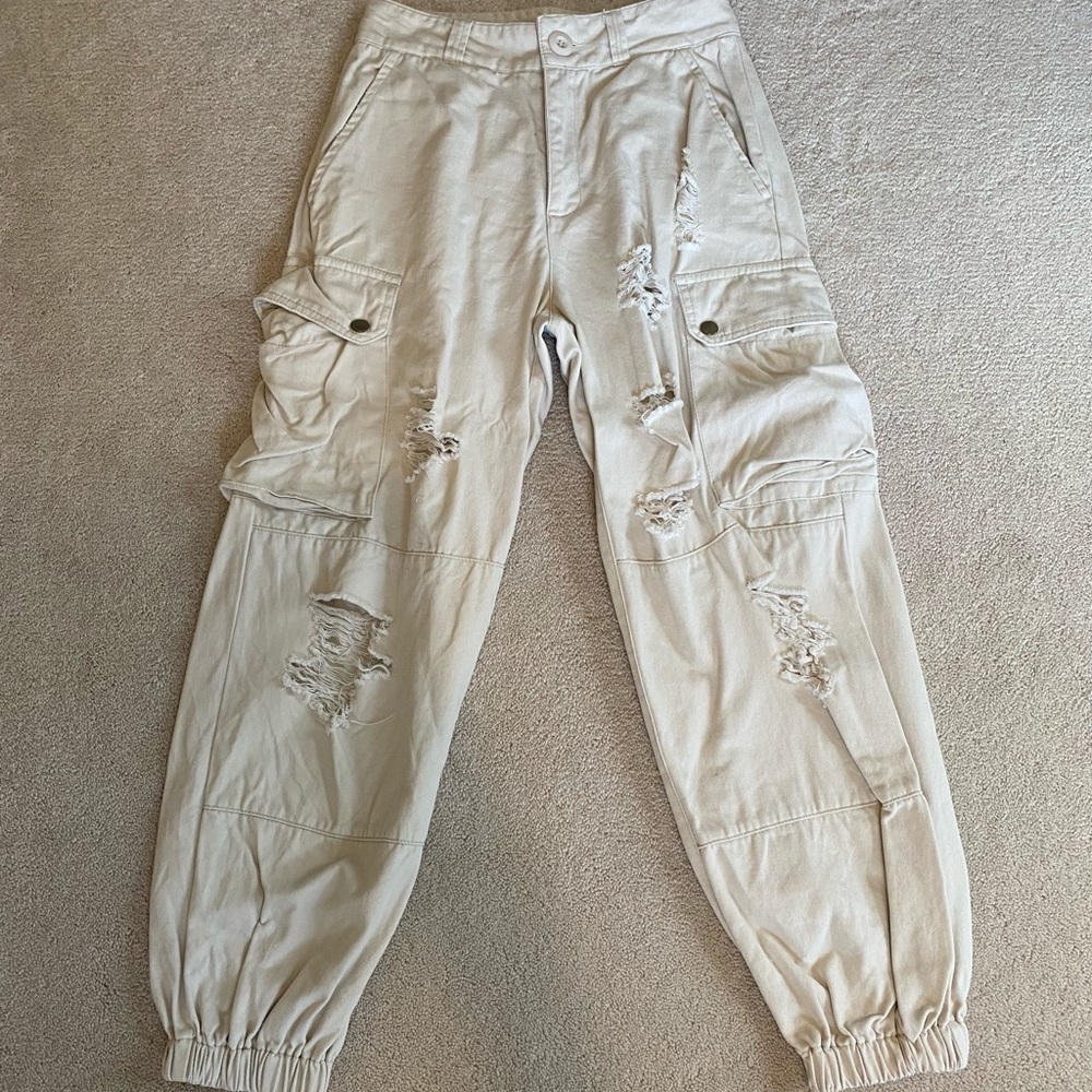 Cream Ripped Jeans